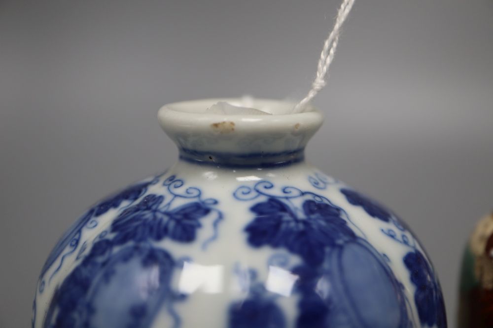 A Chinese blue and white vase and three other items, tallest 10cm